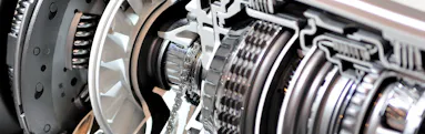 A close up of an engine after a transmission fluid change service was done